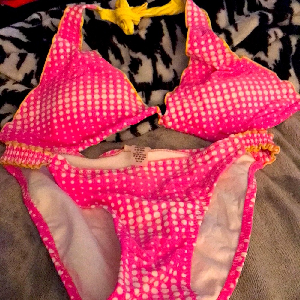 Bikini bathing suit. Top is a medium and bottom is a small.
